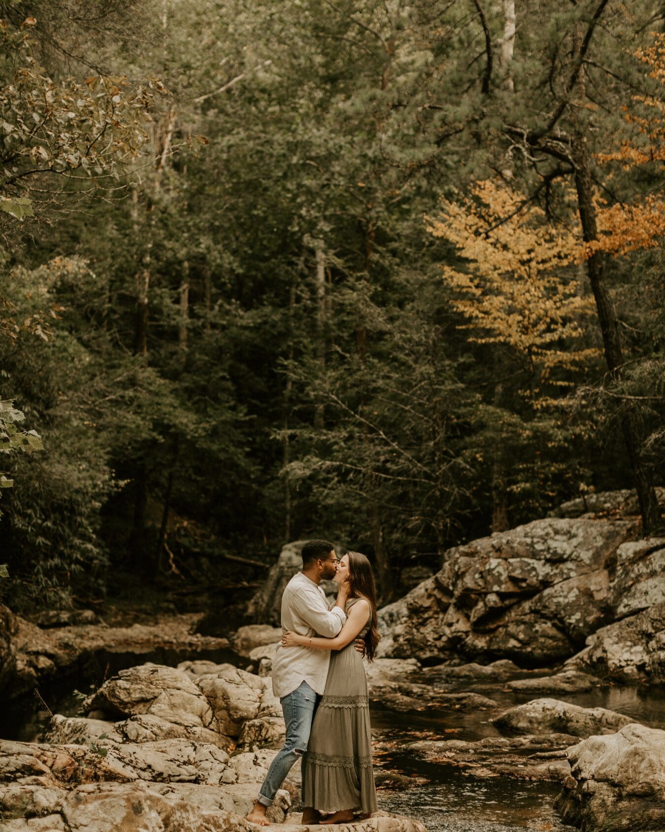 Couple embracing at Fall Engagement session in East Tennessee