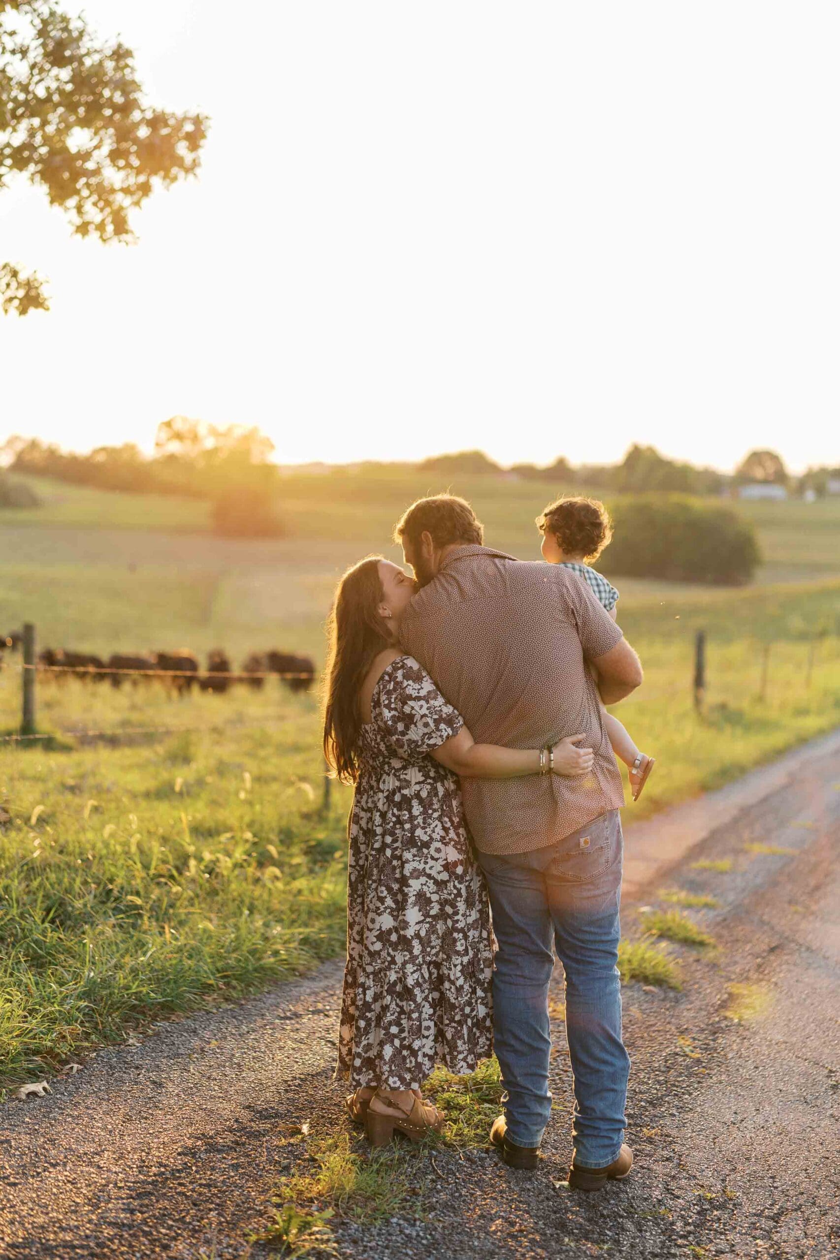 Family embracing at golden hour during Greeneville family session